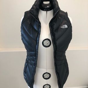 Black north face down vest